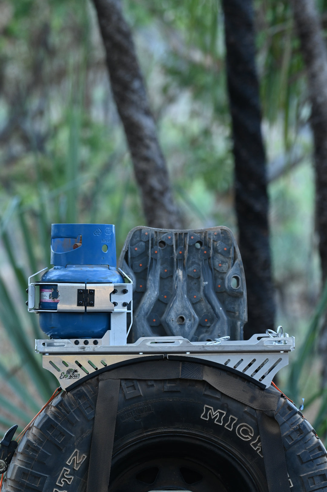 Aluminium gas bottle holder and spare tyre rack mounted on swing away carrier